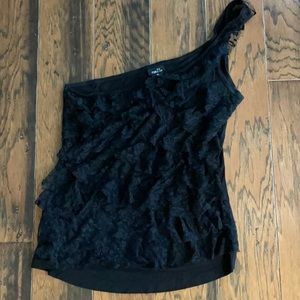 One shoulder ruffle black top Size says XL but definitely fits like a large.